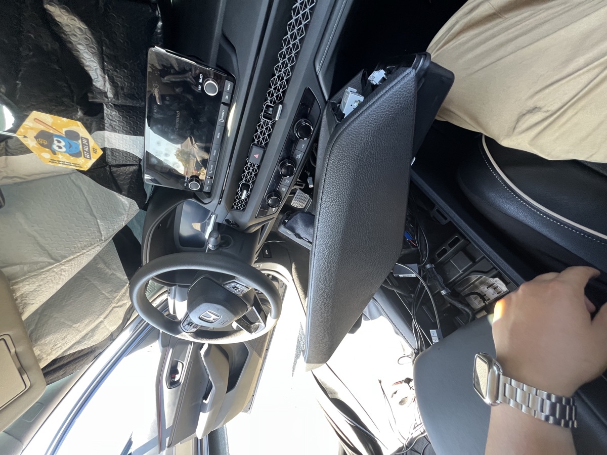 Honda interior during installation with center-console trim removed