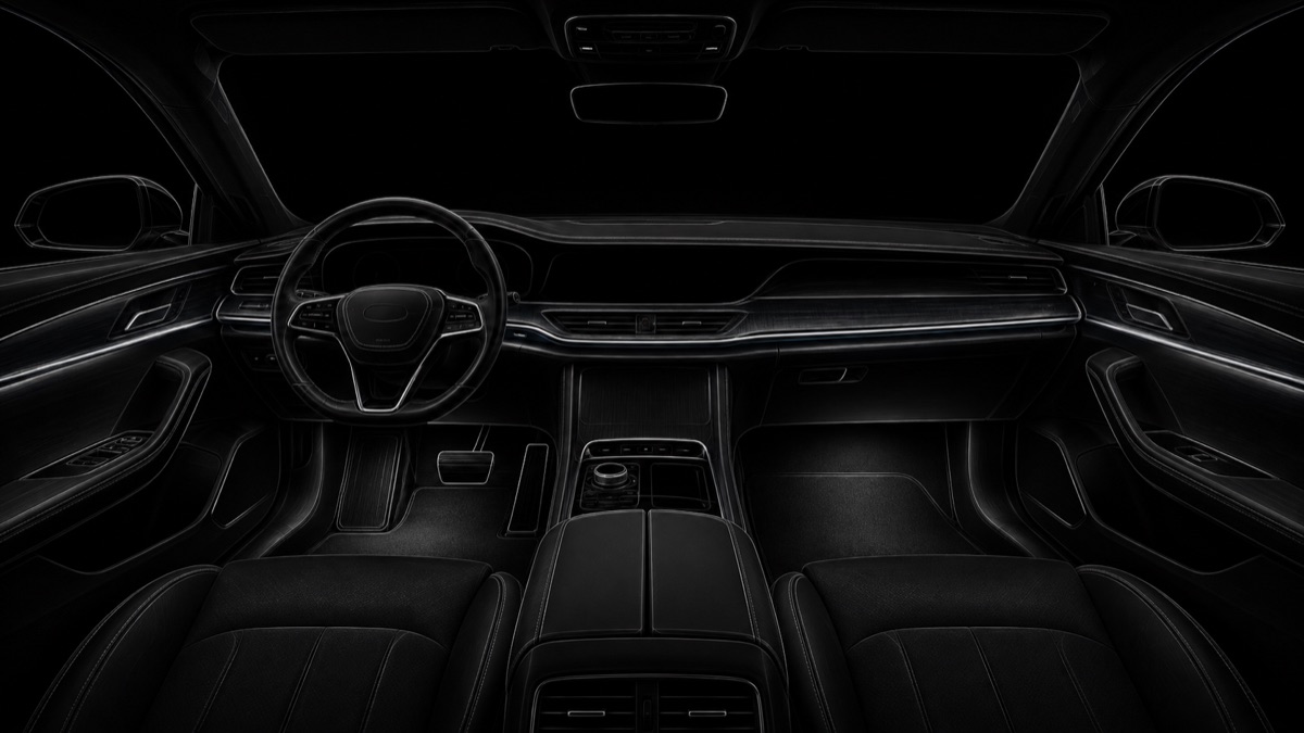 Dark line-art view of a premium vehicle interior showing configurable lighting zones